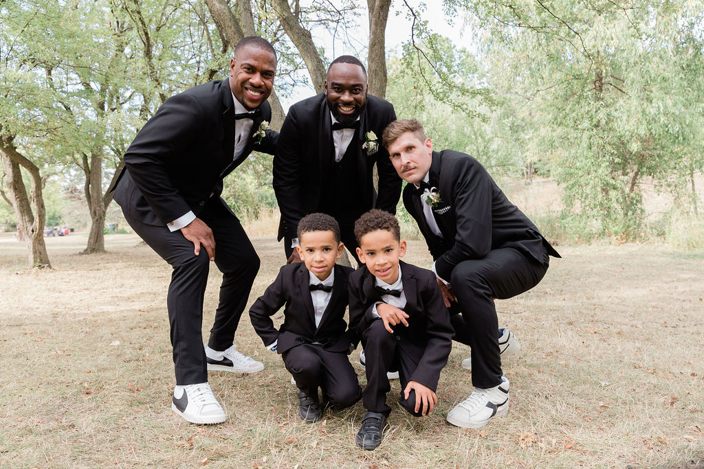 Groomsmen and children at Centennial Park after marriage ceremony