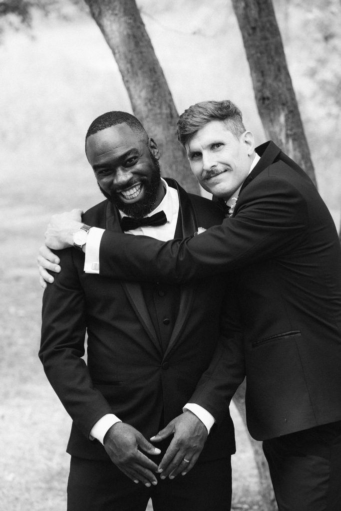 Groom and groomsman at Centennial Park after marriage ceremony
